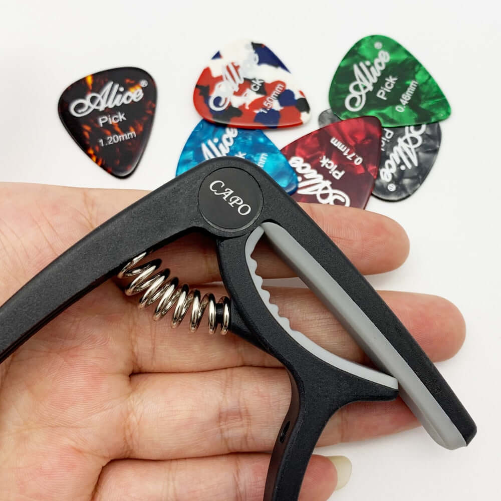 Guitar capo and guitar pick set guitarmetrics