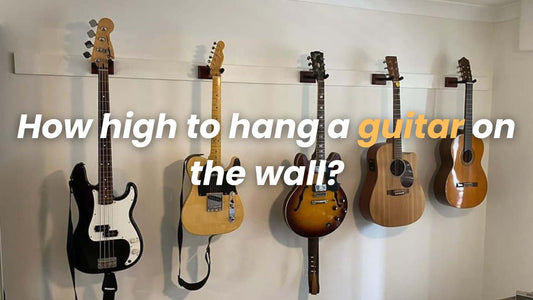 How high to hang a guitar on the wall?