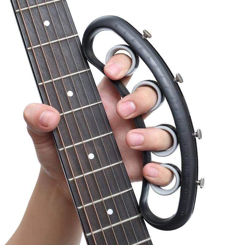 GuitarGuard™ Guitar finger extenders and exerciser guitarmetrics